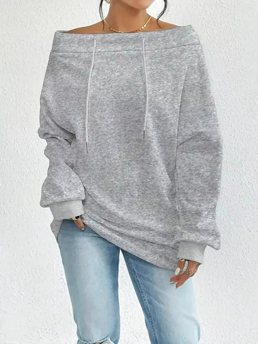 Women's off-shoulder long sleeve sweatshirt with drawstring details, stylish and comfortable from Plush Fashion Hub.