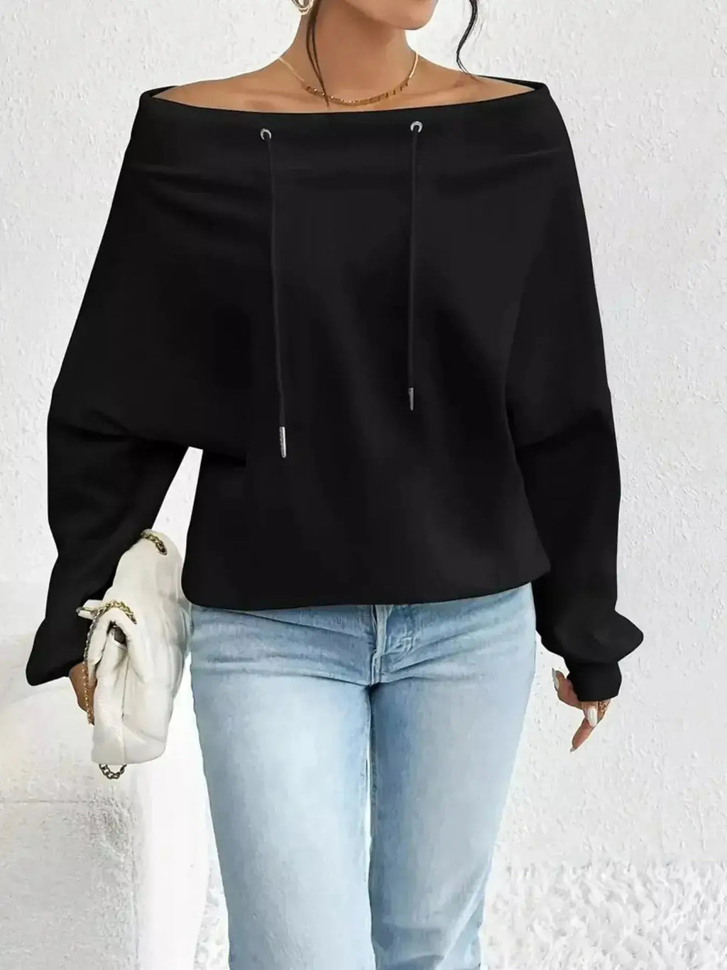 Women’s off-shoulder long sleeve drawstring sweatshirt by Plush Fashion Hub, featuring a casual, stylish design with a relaxed fit.