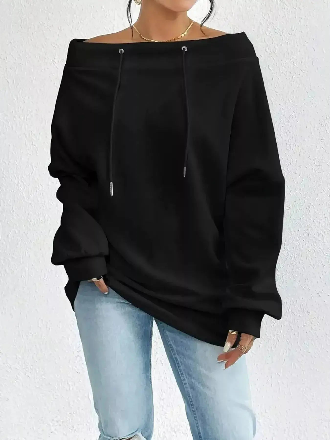 Women's off-shoulder long sleeve sweatshirt with drawstrings by Plush Fashion Hub, featuring a casual and stylish fit.