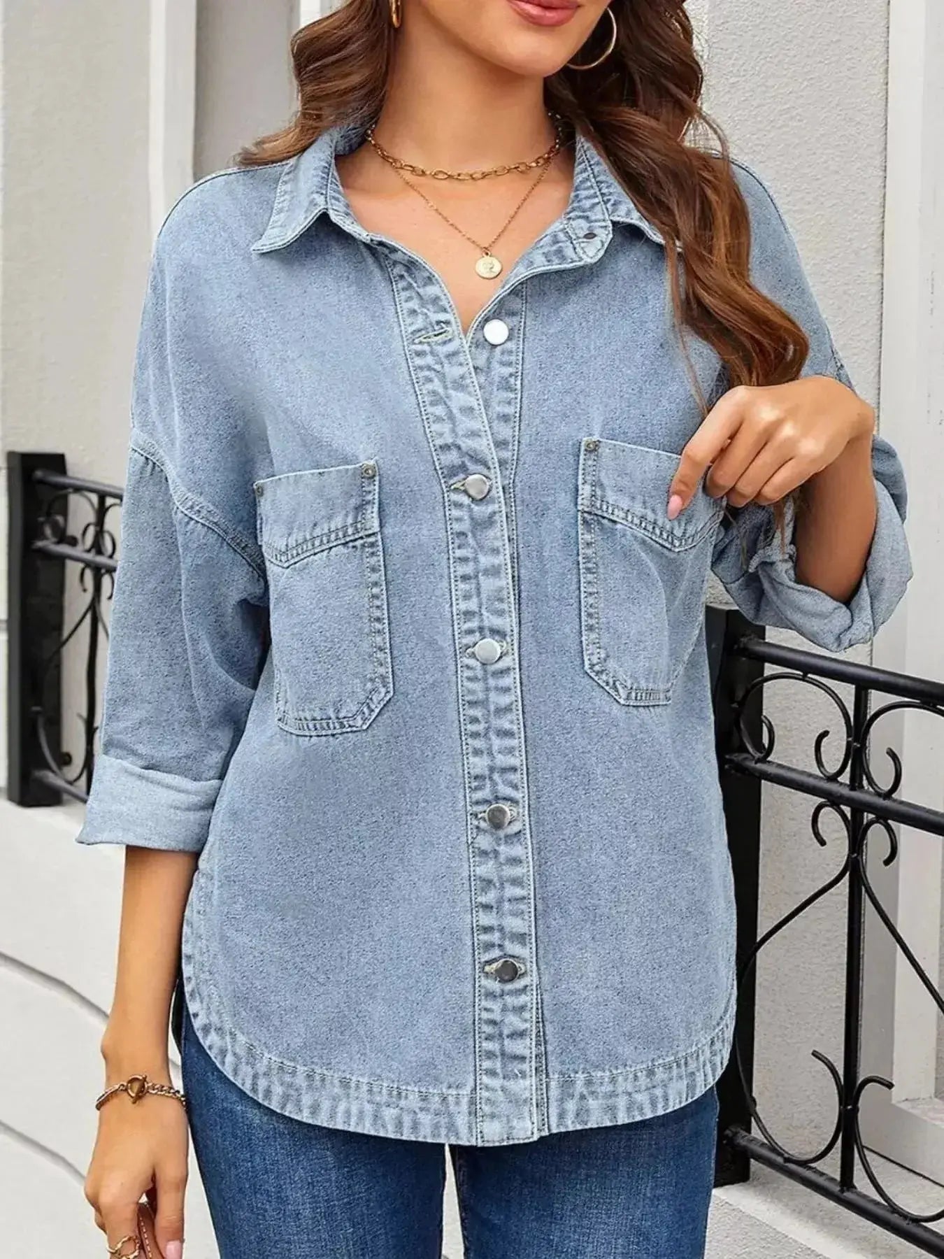 Women’s oversized denim jacket with button-up front, relaxed fit casual outerwear by Trendsi, shown in a classic denim style.