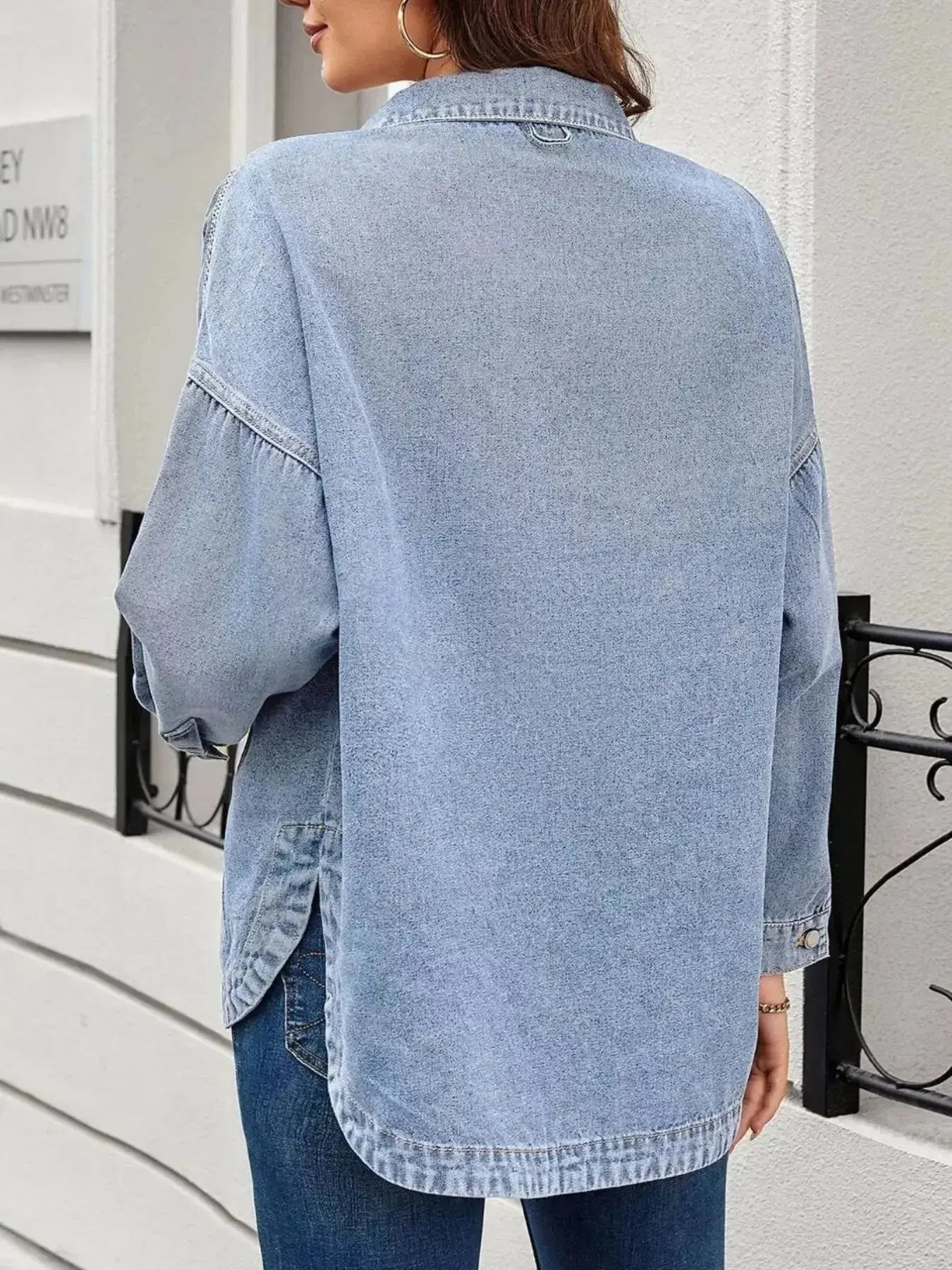 Women’s oversized denim jacket by Trendsi featuring a relaxed fit, button-up front, casual style, and classic denim fabric.