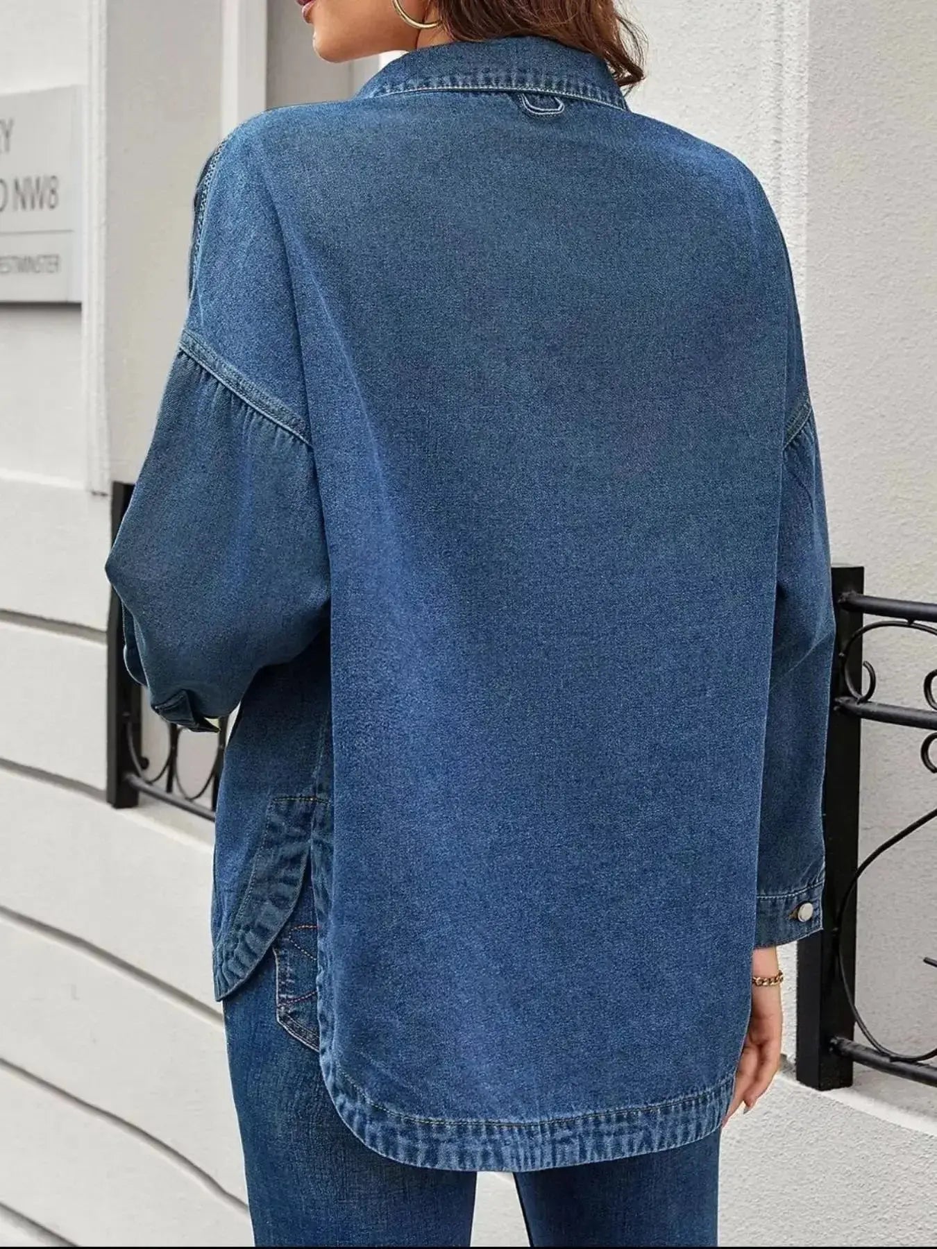 Women’s oversized denim jacket by Trendsi, relaxed fit casual outerwear with button-up front and classic denim fabric.