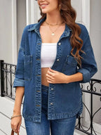 Women’s oversized denim jacket with button-up front, relaxed fit, casual outerwear by Trendsi, shown on a model.