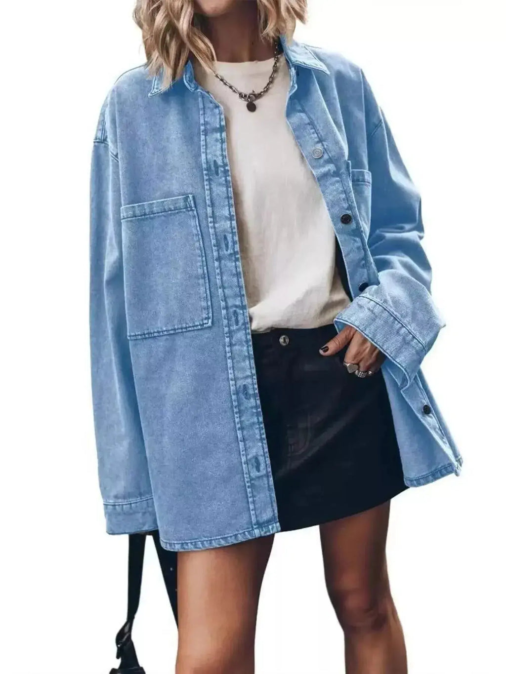Women’s oversized denim shirt by Trendsi, relaxed fit button-up top with casual, chic style, ideal for everyday wear.