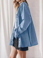 Women’s oversized denim button-up shirt by Trendsi, relaxed fit, casual chic style, shown in light blue denim fabric.