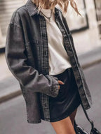 Women’s oversized denim shirt by Trendsi, relaxed fit button-up shirt with casual chic style, shown in classic blue denim fabric.