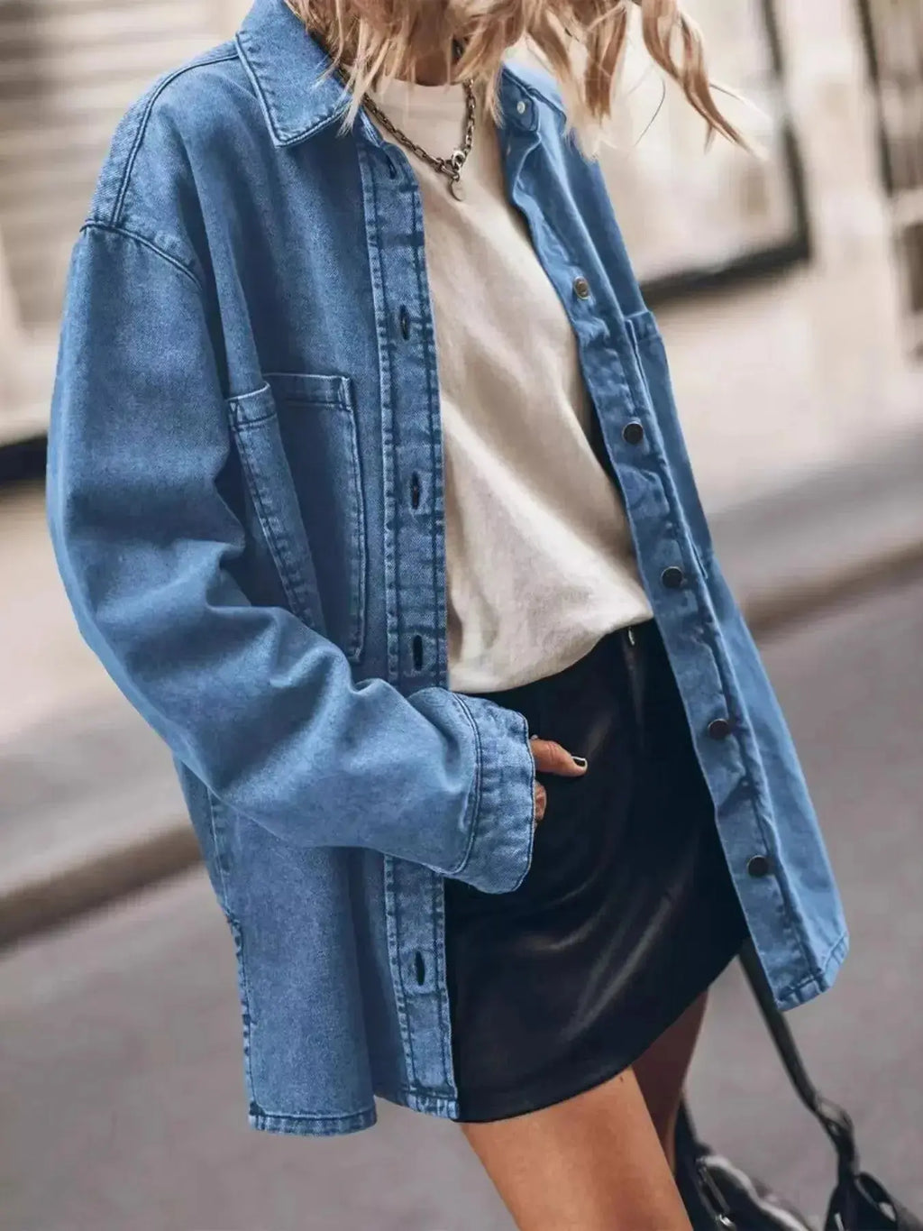 Women’s oversized denim shirt by Trendsi, relaxed fit button-up style with casual, chic design, shown in medium blue denim fabric.
