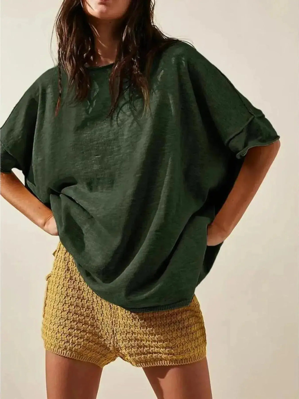 Women’s oversized drop-shoulder round neck casual T-shirt by Plush Fashion Hub, relaxed fit with a comfortable, trendy look.