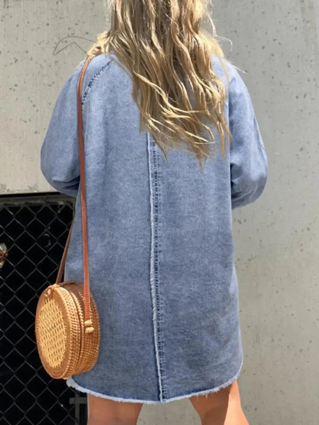 Women’s oversized long sleeve denim shirt dress with pockets, trendy casual denim dress by Trendsi, shown on a model.