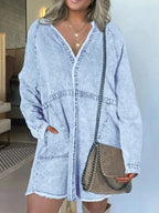 Women’s oversized long sleeve denim shirt dress with pockets, stylish casual denim dress by Trendsi, showing front view with pockets.
