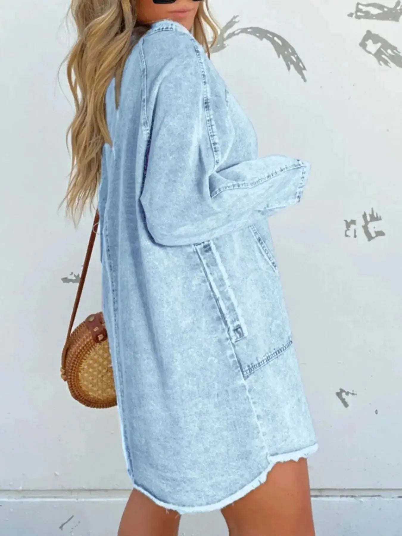 Women’s oversized long sleeve denim shirt dress with pockets, featuring a relaxed fit and casual style by Trendsi.