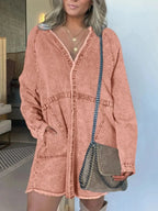 Women’s oversized long sleeve denim shirt dress with front pockets, casual style, by Trendsi.