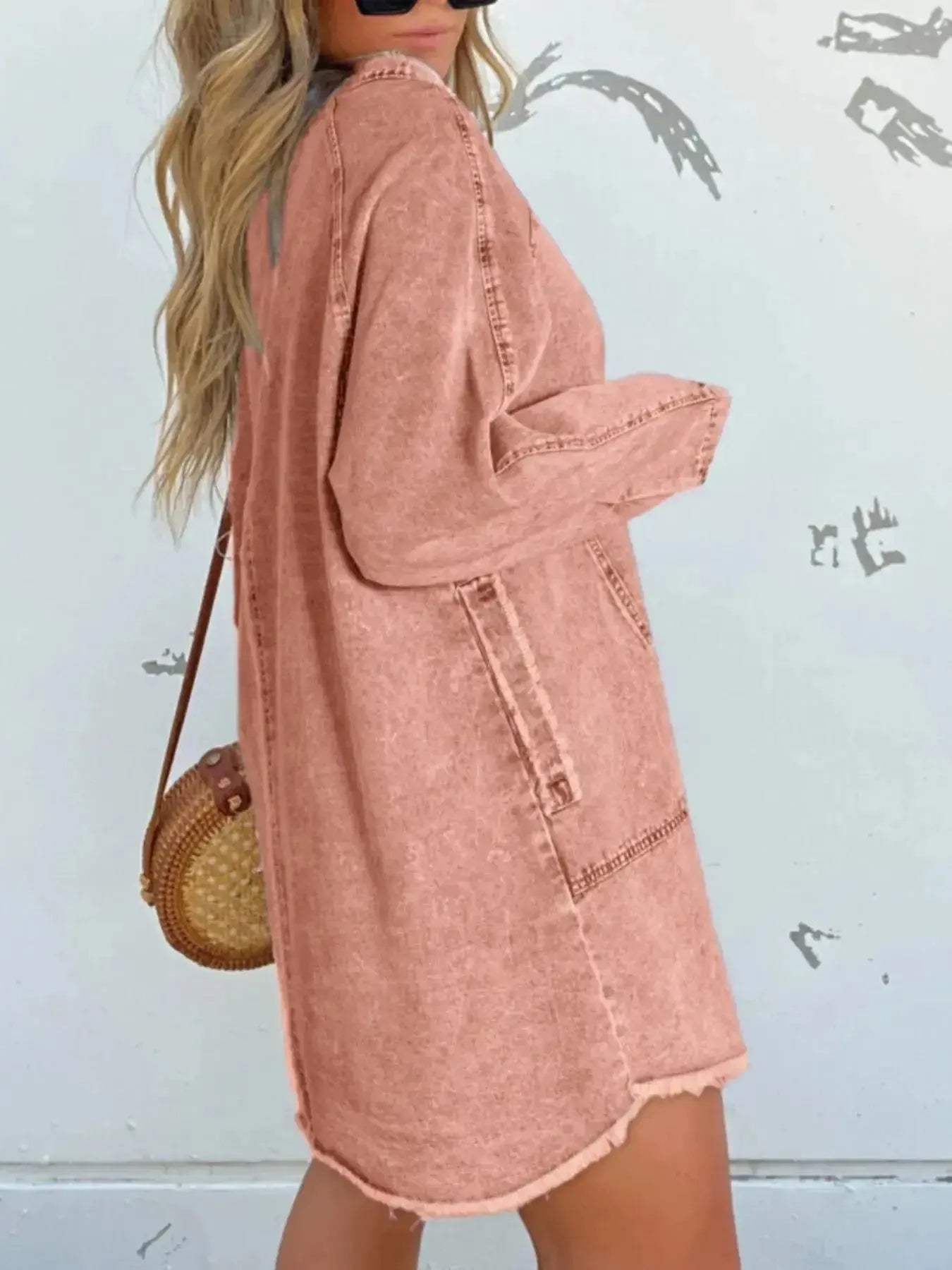 Women’s oversized denim shirt dress with long sleeves and front pockets by Trendsi, casual style perfect for everyday wear.