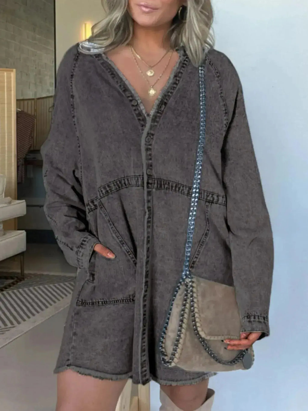 Women’s oversized long sleeve denim shirt dress with front pockets, casual style by Trendsi, made from durable denim fabric.