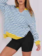 Women’s oversized notched neck sweatshirt with contrast stitching, soft knit sweater from Trendsi, featuring a relaxed fit and stylish design.