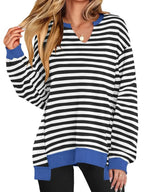 Women's oversized notched neck sweatshirt with contrast stitching, stylish and comfortable sweater by Trendsi worn by a model.
