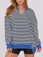 Women’s oversized notched neck sweatshirt with contrast stitching, casual sweater by Trendsi, featuring a relaxed fit and stylish design.