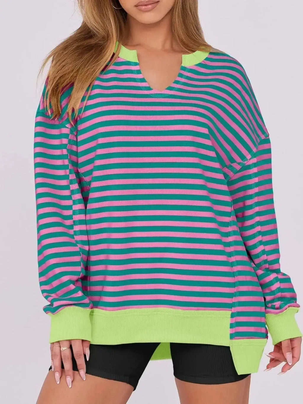 Women's oversized notched neck sweatshirt with contrast stitching, stylish and comfortable sweater by Trendsi.