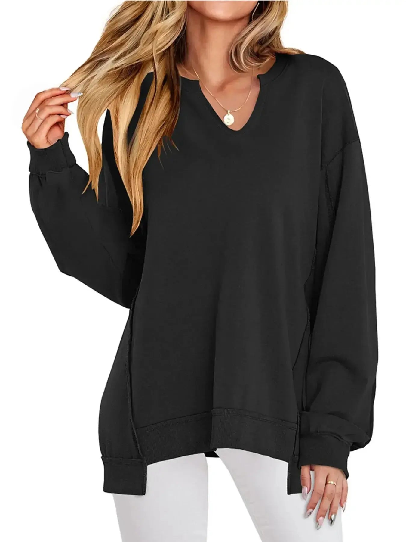 Women's oversized notched neck sweatshirt with contrast stitching from Trendsi, featuring a relaxed fit and stylish neckline.