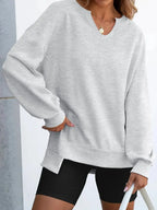 Women’s oversized notched neck sweatshirt with contrast stitching, stylish and comfortable, from Trendsi.