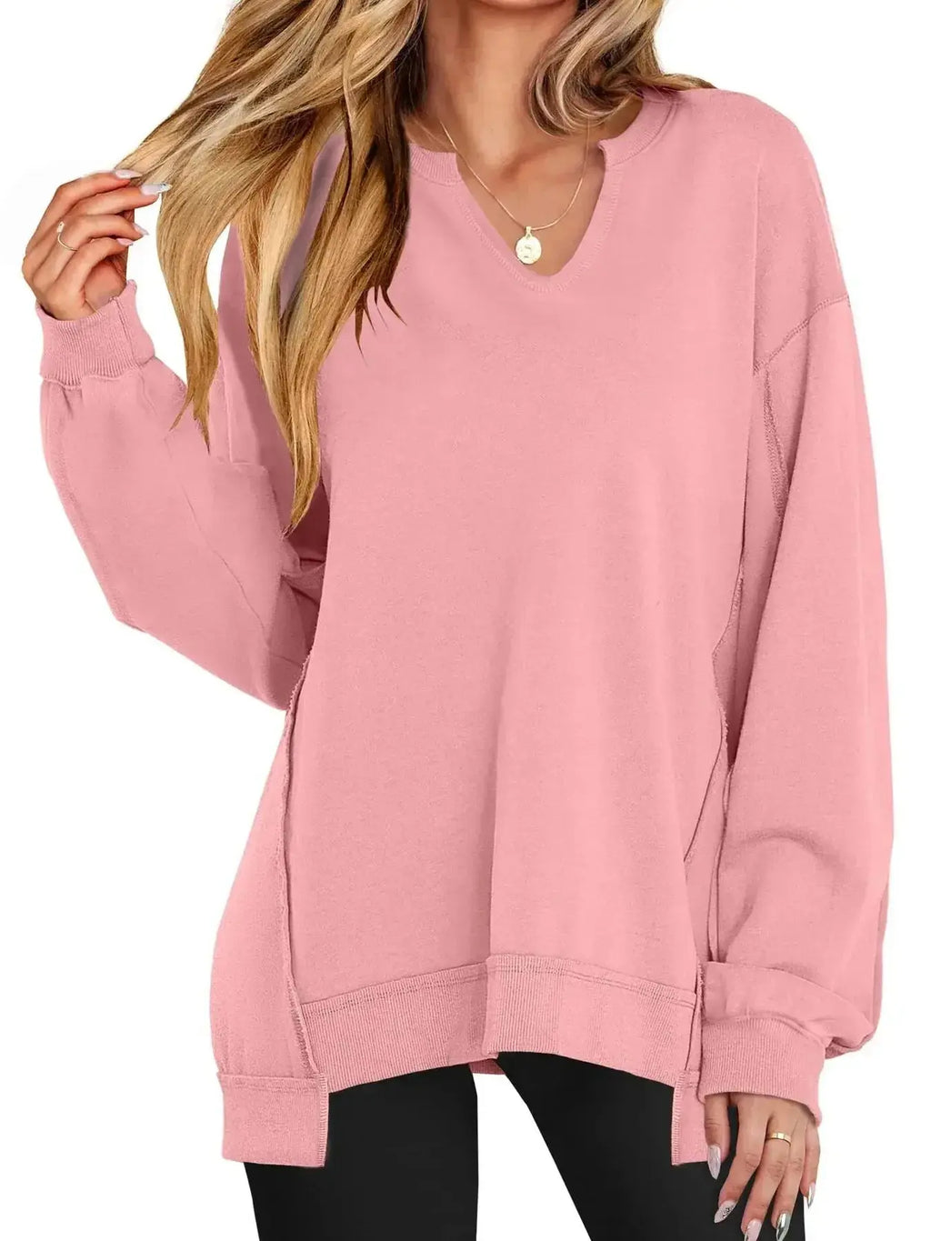 Women’s oversized notched neck sweatshirt with contrast stitching, stylish sweater from Trendsi featuring a relaxed fit and modern design.