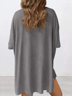 Women's oversized round neck loungewear set from Trendsi, featuring a comfortable two-piece lounge shirt and matching pants.