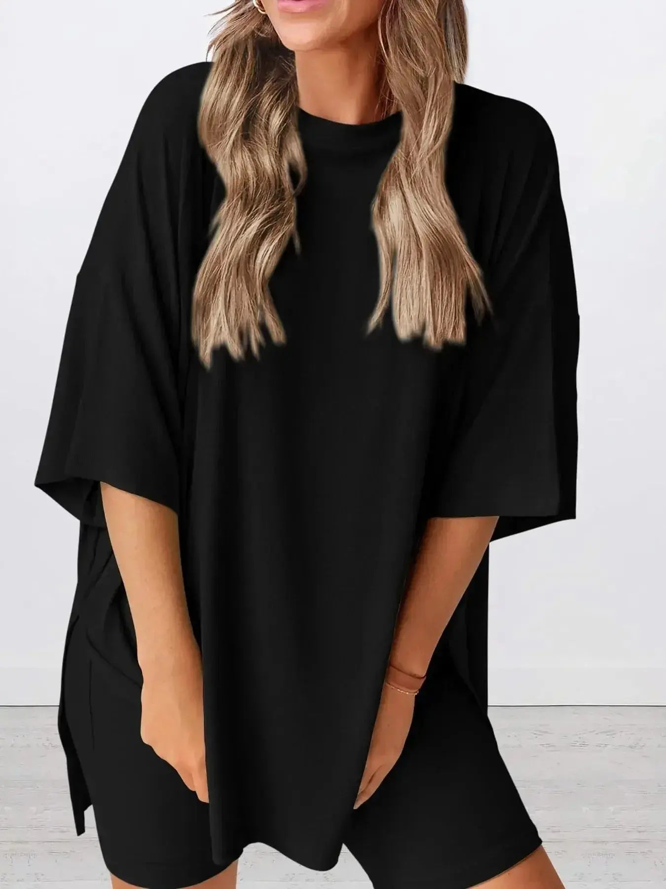 Women’s oversized round neck loungewear shirt from Trendsi, soft and comfortable two-piece lounge set for relaxed wear.