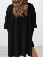 Women's oversized round neck loungewear set by Trendsi, featuring a comfortable two-piece shirt and lounge pants.