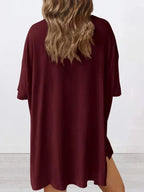 Women's oversized round neck loungewear set by Trendsi, featuring a comfortable two-piece shirt and lounge pants.