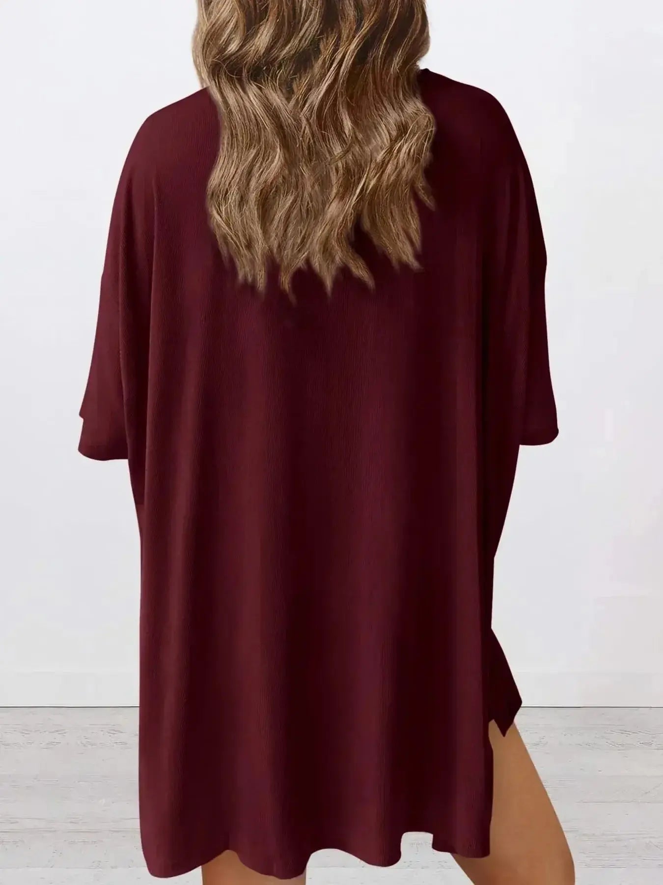 Women's oversized round neck loungewear set by Trendsi, featuring a comfortable two-piece shirt and lounge pants.