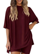 Women’s oversized round neck loungewear set by Trendsi, featuring a comfortable two-piece shirt and lounge pant ensemble.
