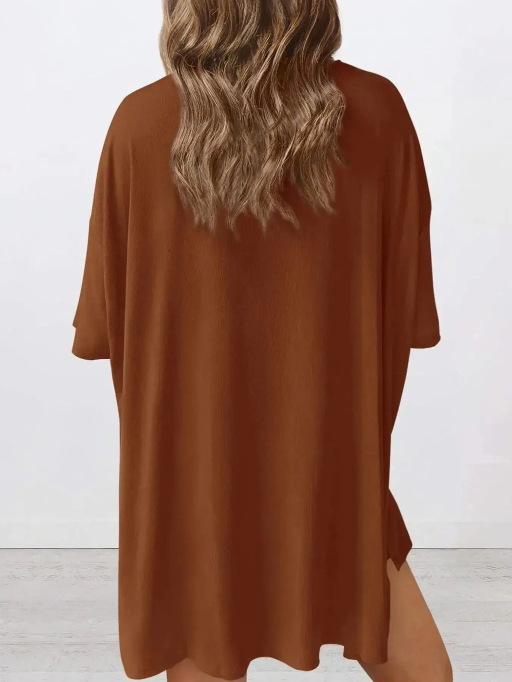 Women's oversized round neck loungewear set by Trendsi, featuring a comfy two-piece shirt and lounge pants for relaxed wear.