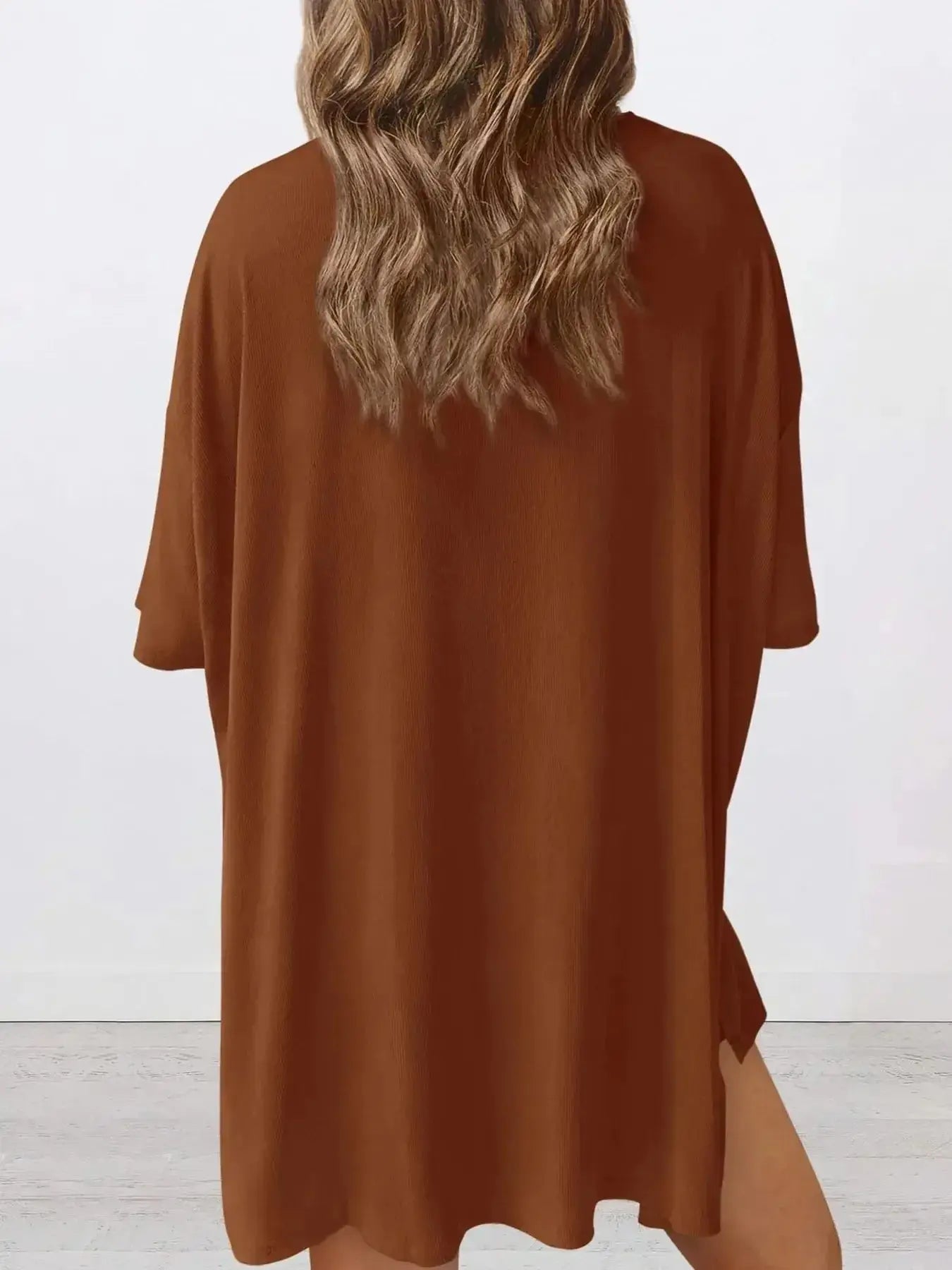 Women's oversized round neck loungewear set by Trendsi, featuring a comfy two-piece shirt and lounge pants for relaxed wear.