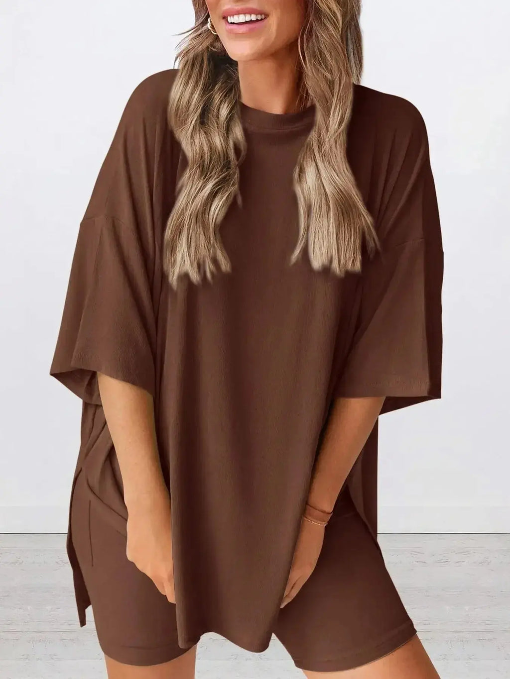 Women’s oversized round neck loungewear shirt from Trendsi, soft and comfortable two-piece lounge set for relaxed wear.