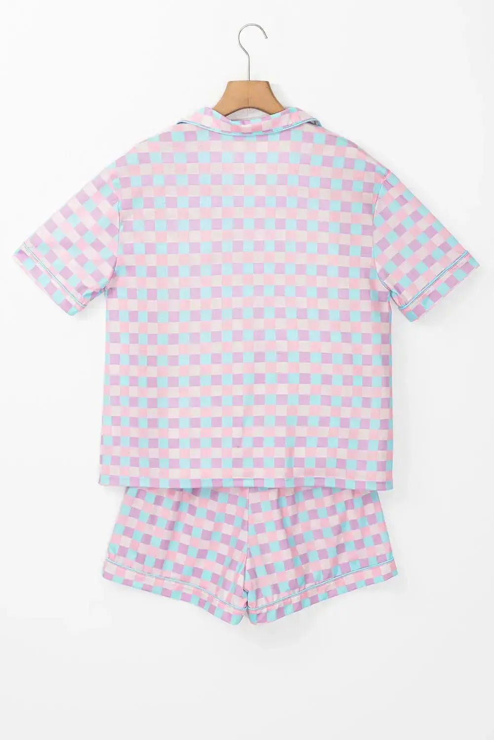Women's plaid collared short sleeve pajama lounge set with pockets, featuring a relaxed fit and cozy fabric from Trendsi.