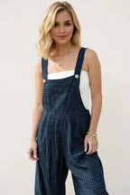 Women's plaid wide-leg cotton romper with functional pockets, stylish and comfortable overalls by Trendsi.