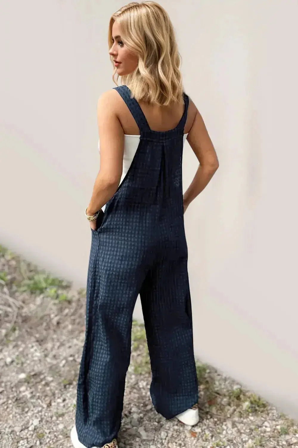 Women’s plaid cotton romper with wide-leg design and functional pockets, stylish and comfortable overalls by Trendsi.