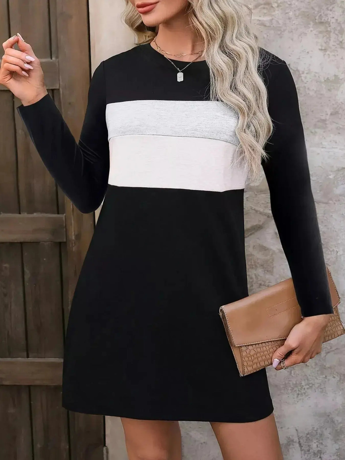 Plus size women's color block long sleeve casual mini dress by Plush Fashion Hub, featuring a stylish and comfortable design.