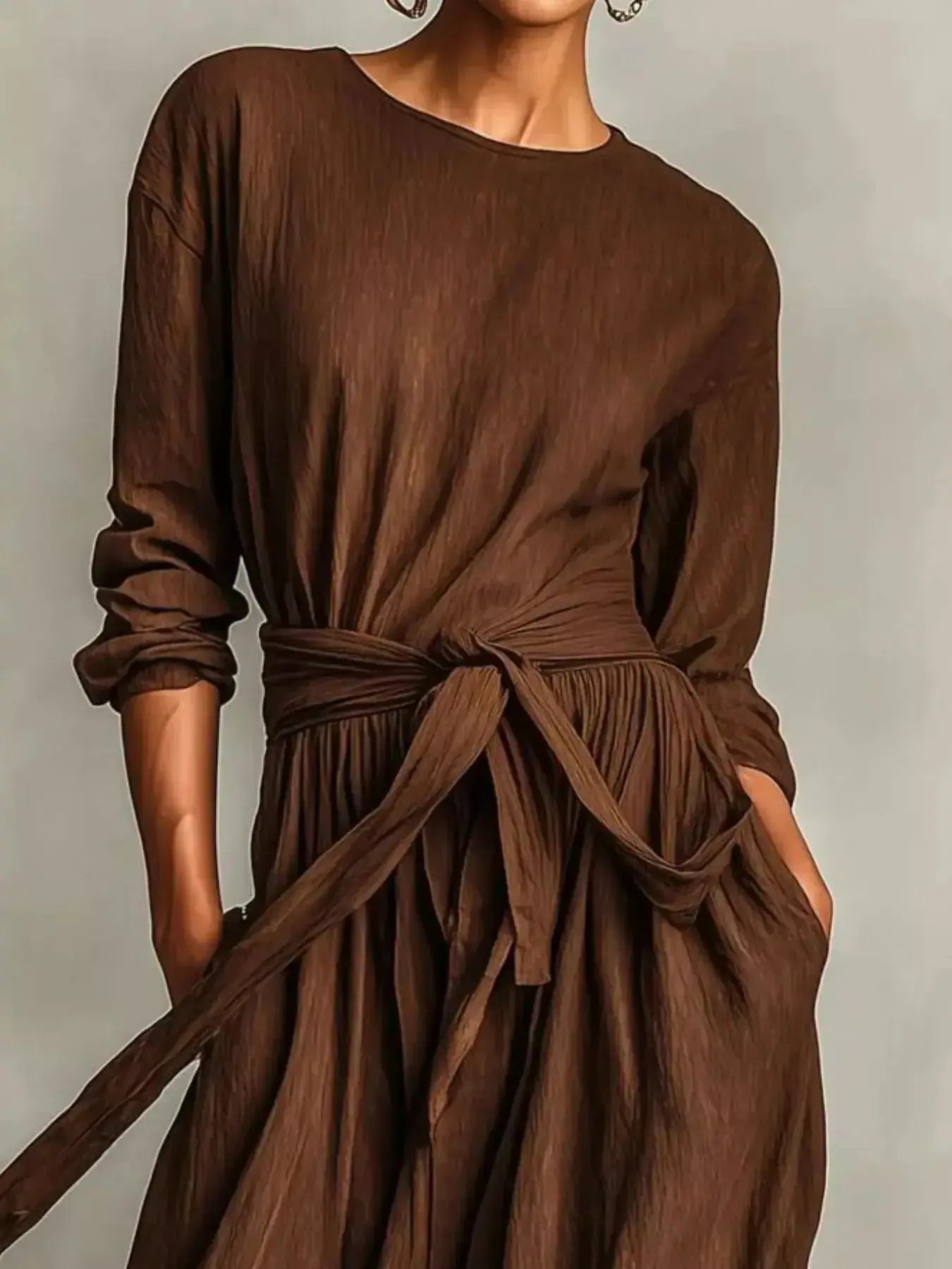 Plus size women's long sleeve maxi dress with tie waist and pockets, stylish and comfortable from Trendsi.