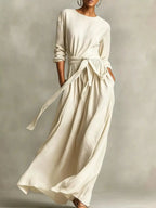 Plus size women's long sleeve maxi dress with tie waist and pockets, stylish and comfortable by Trendsi.