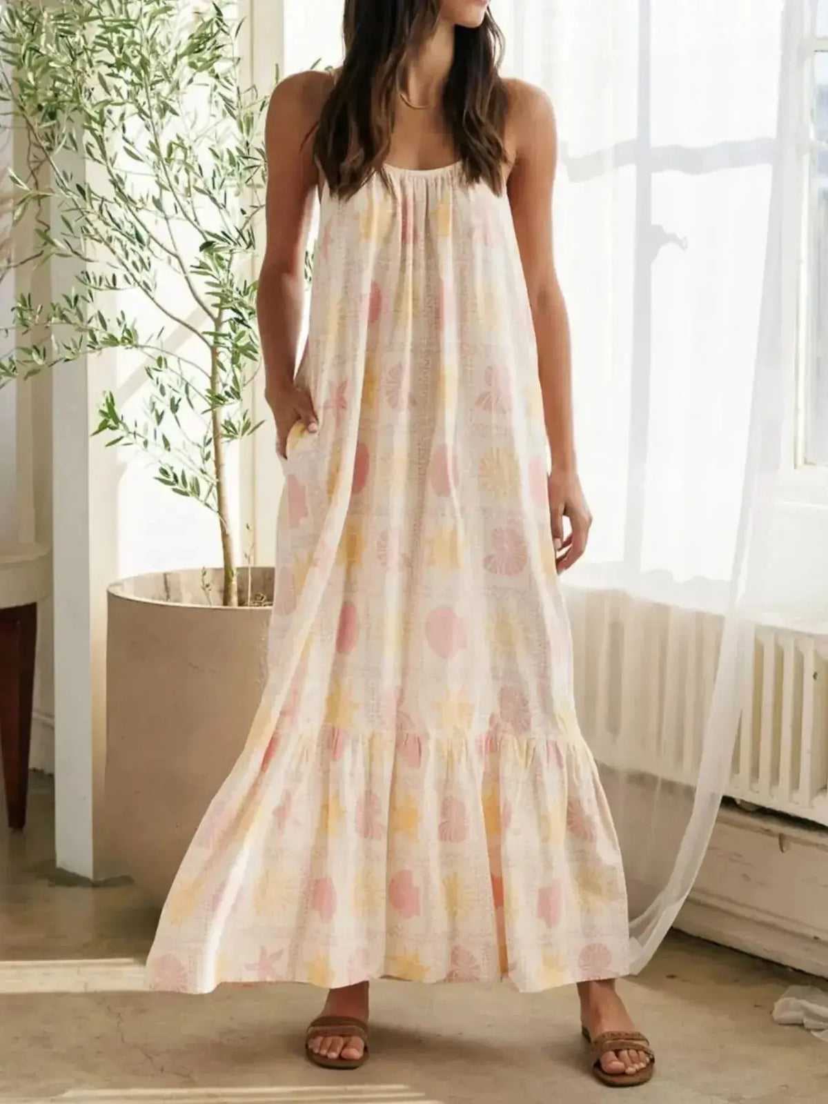 Women’s printed maxi lounge dress with ruffled hem and pockets, comfortable pajamas by Plush Fashion Hub.