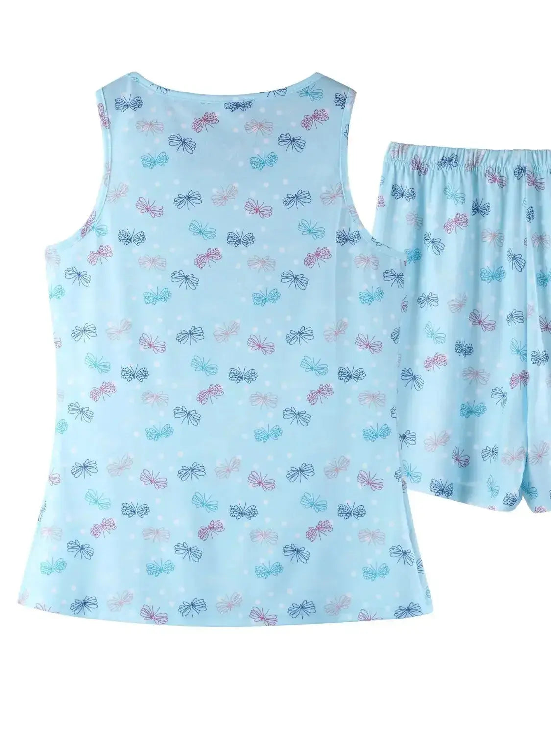 Women’s printed round neck pajama top and shorts lounge set by Trendsi, featuring comfortable fabric and casual sleepwear style.