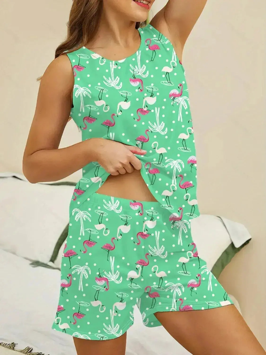 Women’s printed round neck pajama top and shorts lounge set by Trendsi, soft fabric with floral pattern, comfortable sleepwear.