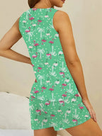 Women’s printed round neck pajama top and shorts lounge set by Trendsi, soft fabric, comfortable sleepwear ensemble.