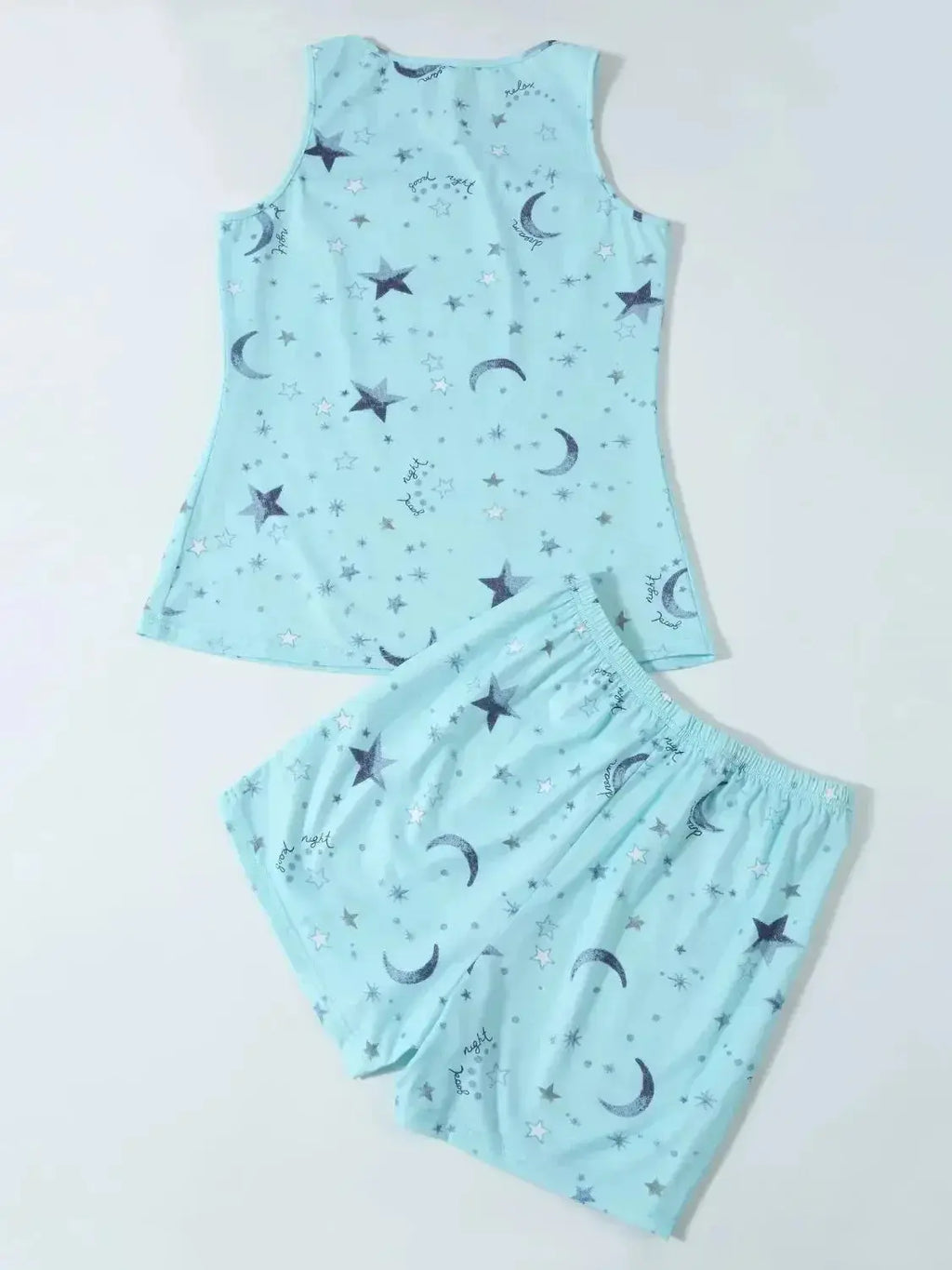 Women’s printed round neck pajama top and shorts lounge set by Trendsi, featuring soft fabric and casual, comfortable styling.