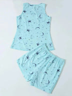 Women’s printed round neck pajama top and shorts lounge set by Trendsi, featuring soft fabric and casual, comfortable styling.