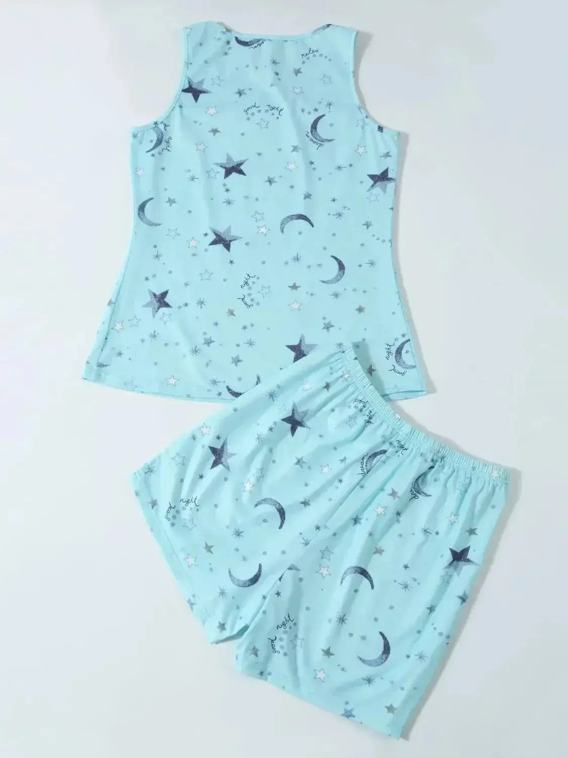 Women’s printed round neck pajama top and shorts lounge set by Trendsi, featuring soft fabric and casual, comfortable styling.