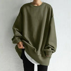 Women’s loose fit round neck pullover sweater in casual knitwear style by Plush Fashion Hub, styled as a cozy dress.