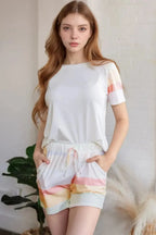 Women's rainbow striped round neck T-shirt and shorts lounge set by Trendsi, casual cozy pajamas with colorful stripes.