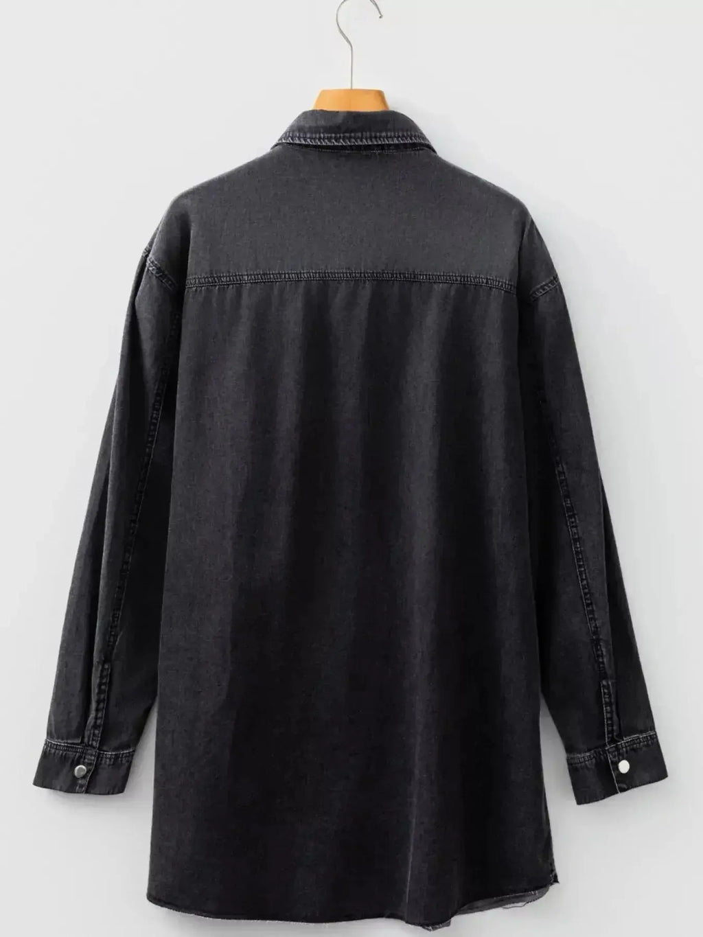 Women's raw hem denim shirt dress with long sleeves and button-down front, made of cotton by Trendsi.